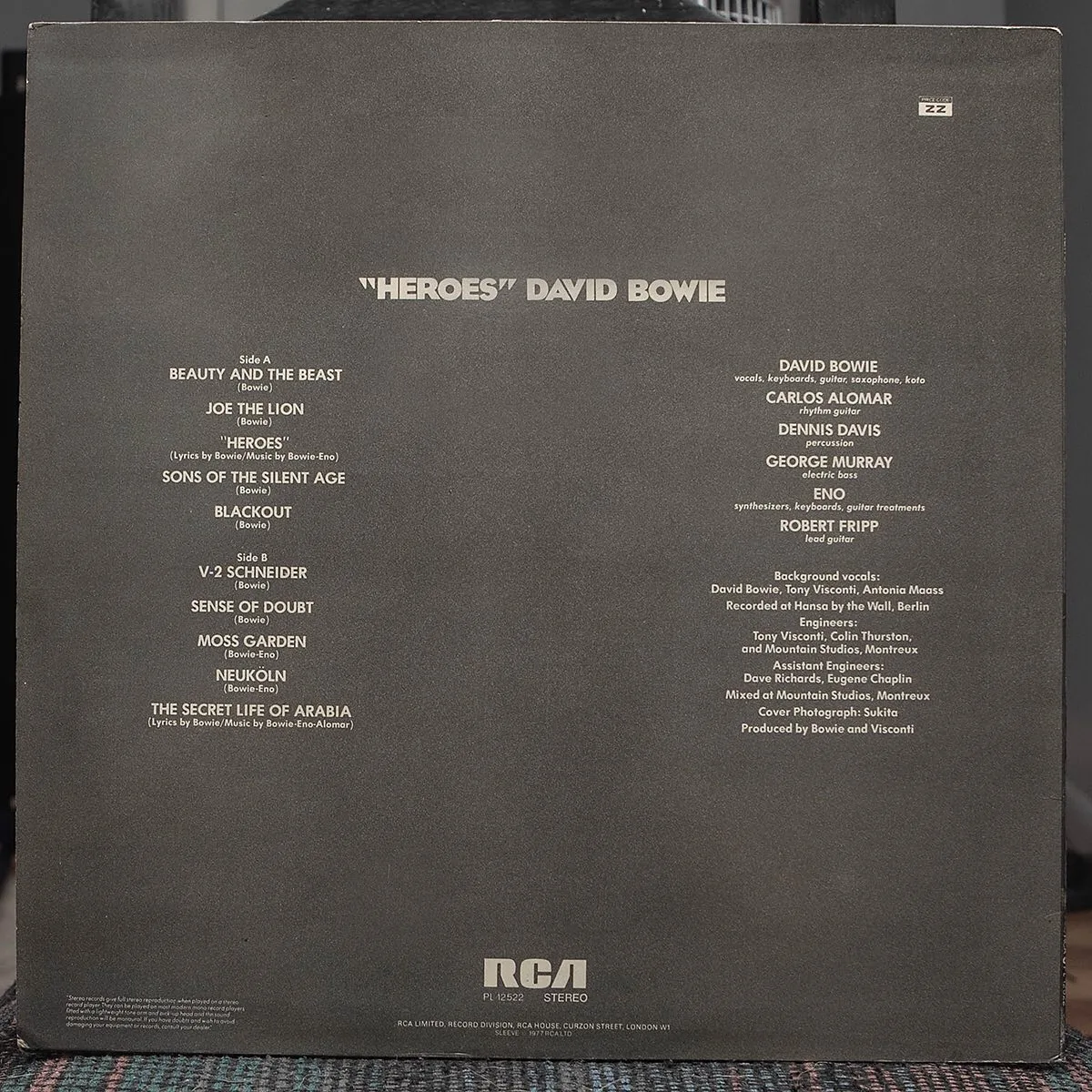 Back of the "Heroes" record sleeve with a track list and credits in small centred type.